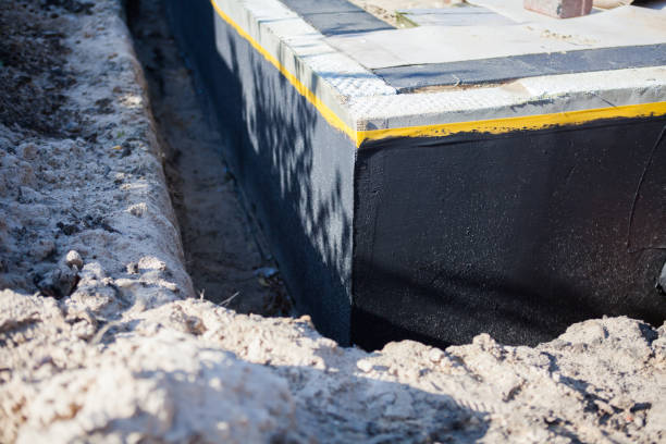 Professional Wet Basement Repair technician working in Minneapolis, MN